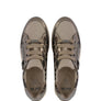 Pair of metallic silver sneakers with laces and a small zipper