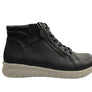 Black sneaker with a white sole