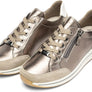 Pair of metallic silver sneakers with laces and a small zipper